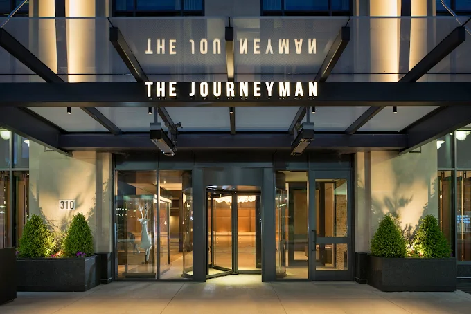 The Journeyman Hotel entrance at dusk